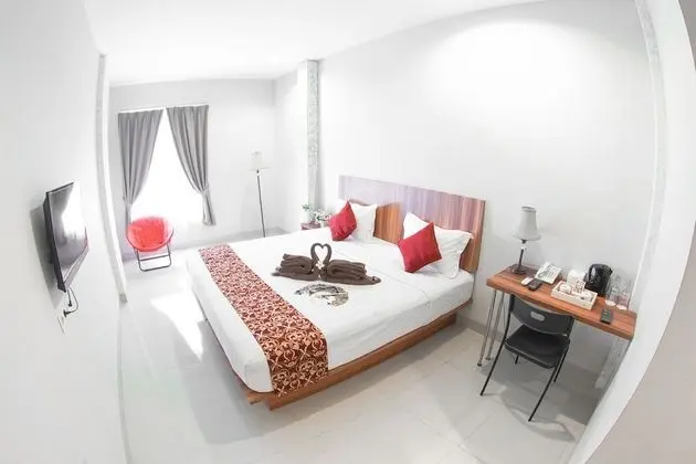 Deluxe Tek Büyük veya İki Ayrı Yataklı Oda