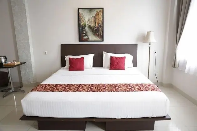 Deluxe Tek Büyük veya İki Ayrı Yataklı Oda