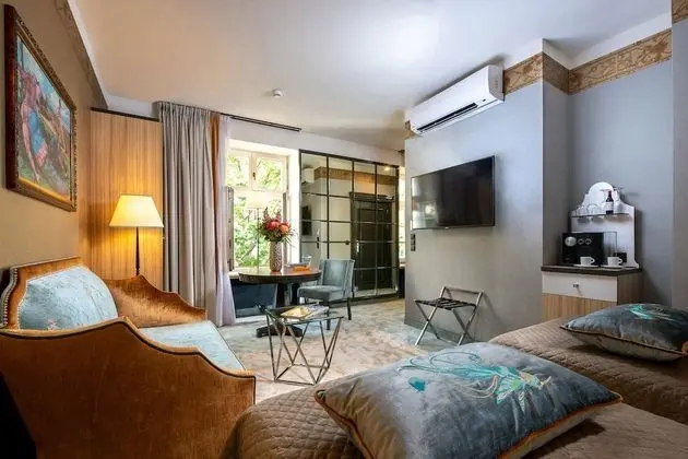 Deluxe Tek Büyük veya İki Ayrı Yataklı Oda
