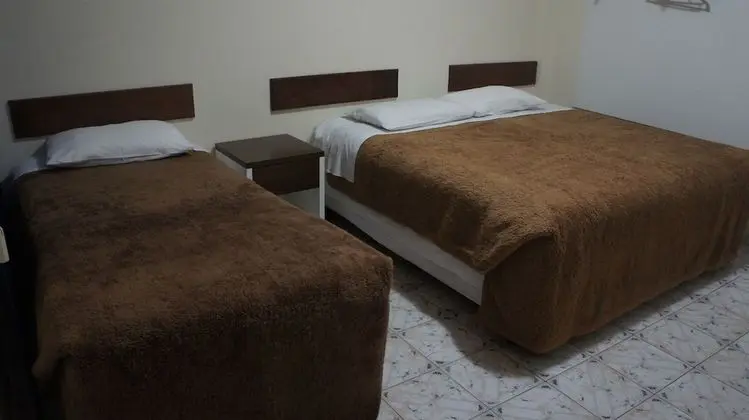 Üç Kişilik Oda