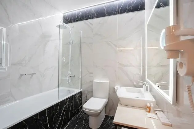 Deluxe Tek Büyük veya İki Ayrı Yataklı Oda