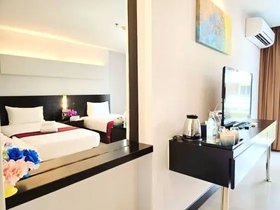 Deluxe Tek Büyük veya İki Ayrı Yataklı Oda
