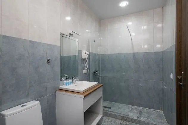 Deluxe Üç Kişilik Oda
