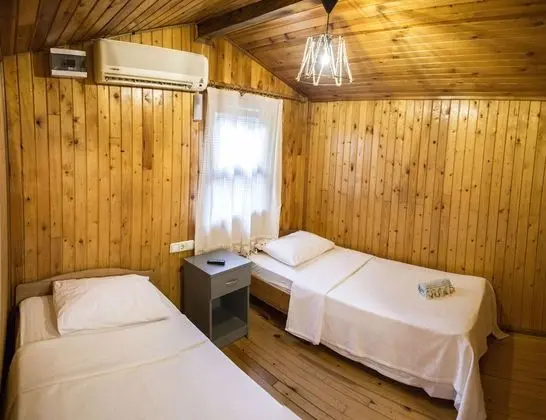 Deluxe Tek Büyük veya İki Ayrı Yataklı Oda