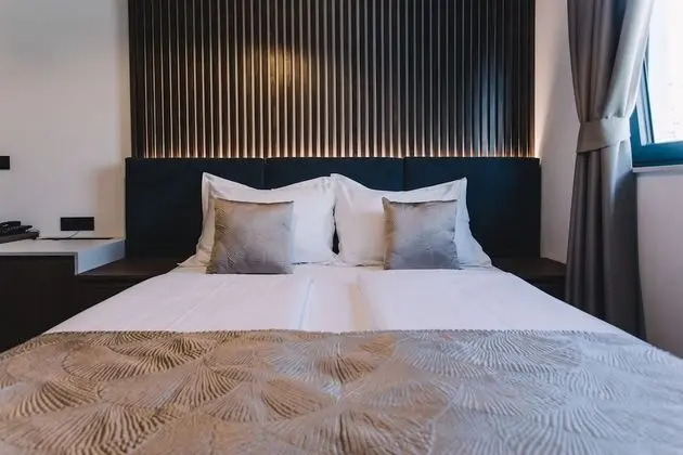 Deluxe Tek Büyük veya İki Ayrı Yataklı Oda