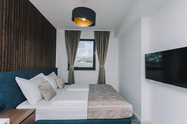 Deluxe Tek Büyük veya İki Ayrı Yataklı Oda