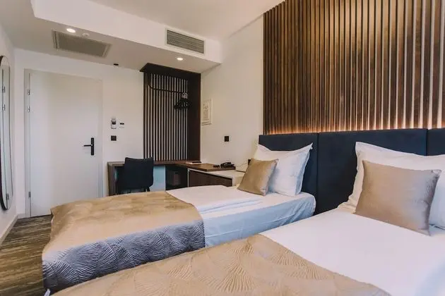 Deluxe Tek Büyük veya İki Ayrı Yataklı Oda