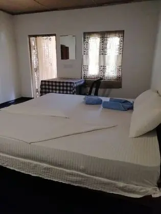 Standard Üç Kişilik Oda, Bahçe Manzaralı