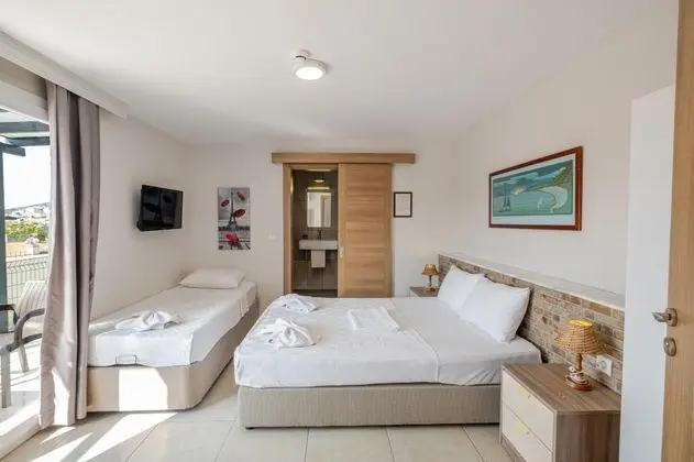 Standart Üç Kişilik Oda, Bahçe Manzaralı
