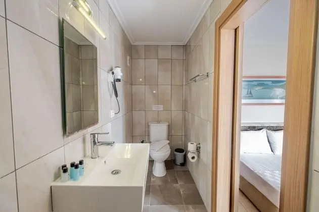 Standart Üç Kişilik Oda, Bahçe Manzaralı
