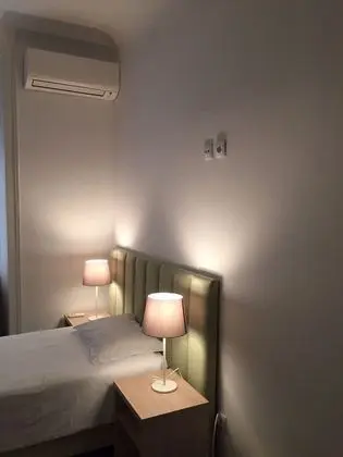 Basic Üç Kişilik Oda, Ortak Banyo