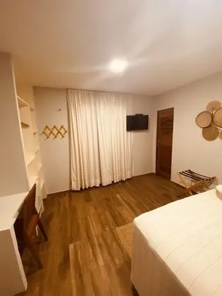 Suíte 302 Quarto Deluxe com cama Double