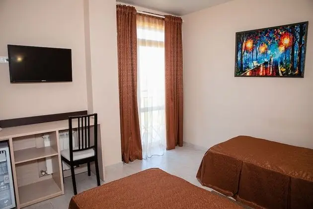 Deluxe Tek Büyük veya İki Ayrı Yataklı Oda