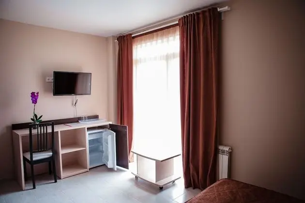 Deluxe Tek Büyük veya İki Ayrı Yataklı Oda