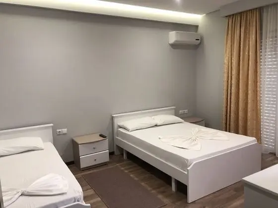 Üç Kişilik Oda