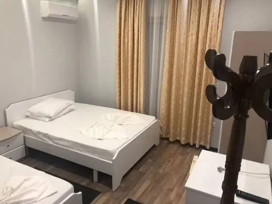 Üç Kişilik Oda