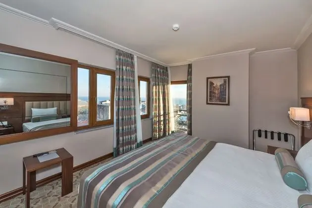 Deluxe Tek Büyük veya İki Ayrı Yataklı Oda
