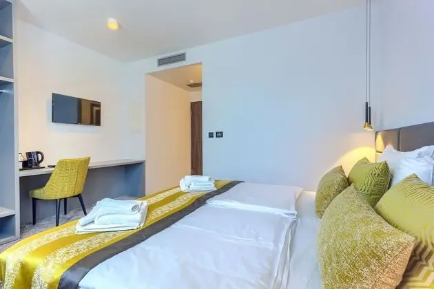 Deluxe Tek Büyük veya İki Ayrı Yataklı Oda