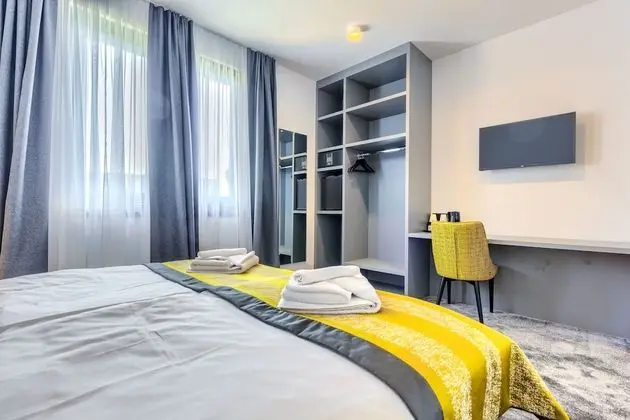 Deluxe Tek Büyük veya İki Ayrı Yataklı Oda