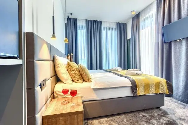 Deluxe Tek Büyük veya İki Ayrı Yataklı Oda