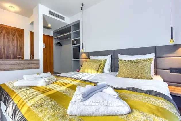 Deluxe Tek Büyük veya İki Ayrı Yataklı Oda