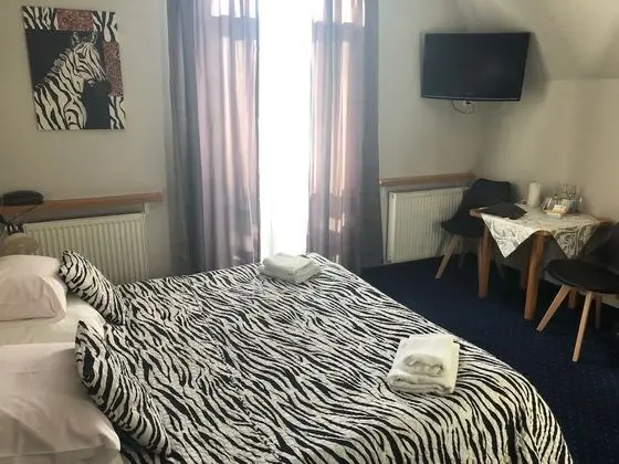 Deluxe Tek Büyük veya İki Ayrı Yataklı Oda