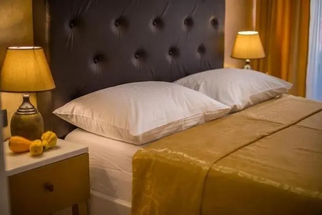 Deluxe Tek Büyük veya İki Ayrı Yataklı Oda