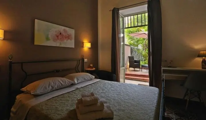 Camera Deluxe  con giardino Capo