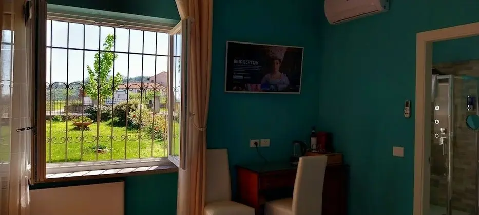 Deluxe Tek Büyük Yataklı Oda, 1 En Büyük (King) Boy Yatak, Bahçe Manzaralı (Queen)