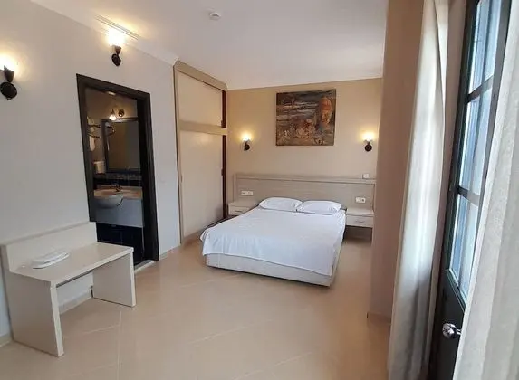 Deluxe Tek Büyük veya İki Ayrı Yataklı Oda
