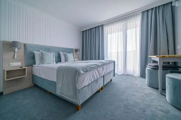 Deluxe Tek Büyük veya İki Ayrı Yataklı Oda