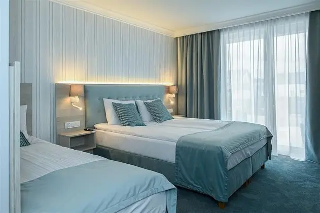 Deluxe Üç Kişilik Oda