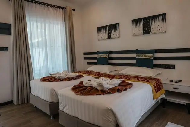 Deluxe Tek Büyük veya İki Ayrı Yataklı Oda