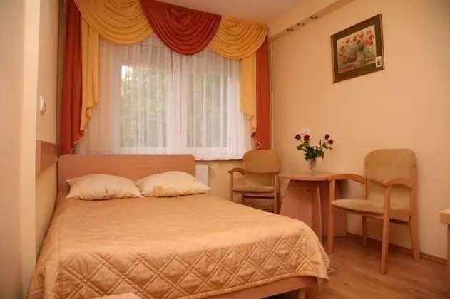 Classic Tek Büyük veya İki Ayrı Yataklı Oda