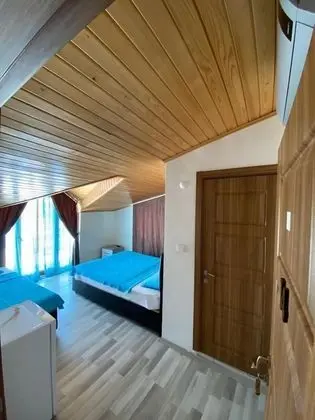 Üç Kişilik Oda