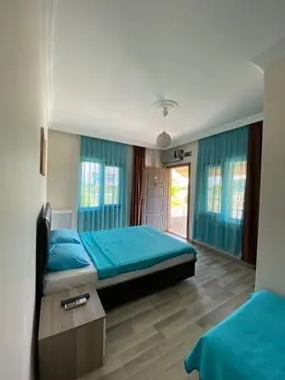 Üç Kişilik Oda