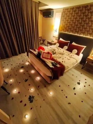 Deluxe Tek Büyük veya İki Ayrı Yataklı Oda