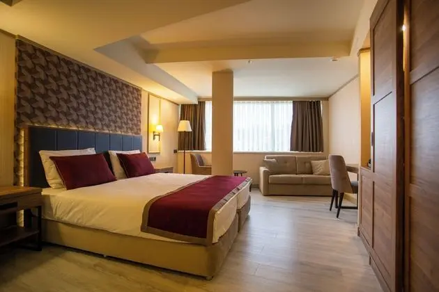 Deluxe Tek Büyük veya İki Ayrı Yataklı Oda