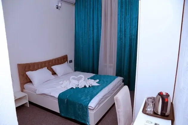 Standard Üç Kişilik Oda, Bahçe Manzaralı