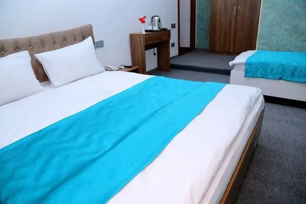 Standard Üç Kişilik Oda, Bahçe Manzaralı