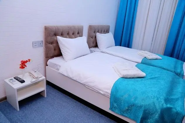 Standard Üç Kişilik Oda, Bahçe Manzaralı