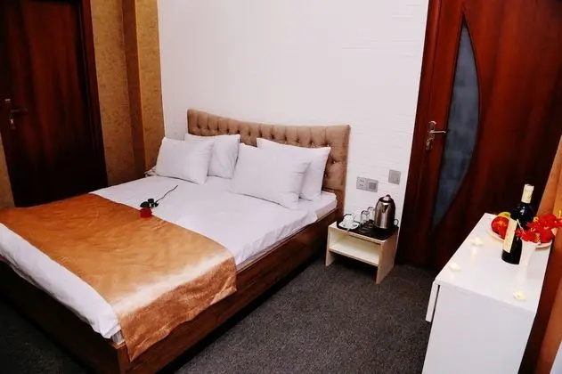 Standard Üç Kişilik Oda, Bahçe Manzaralı