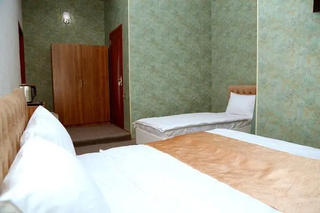 Standard Üç Kişilik Oda, Bahçe Manzaralı