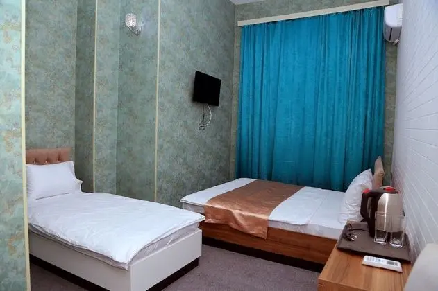 Standard Üç Kişilik Oda, Bahçe Manzaralı