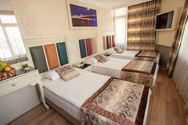 Üç Kişilik Oda