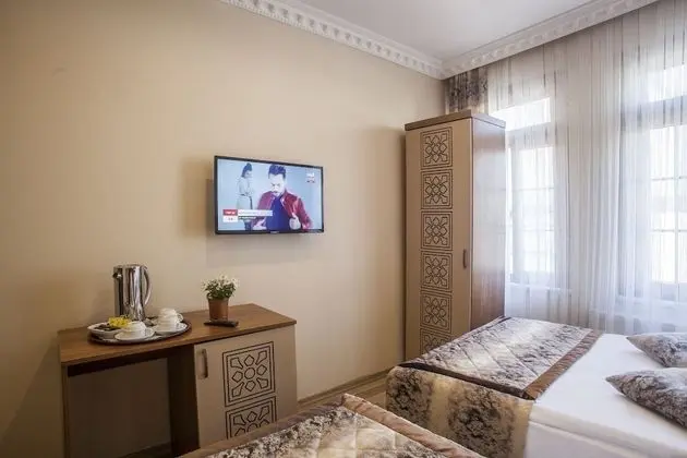 Üç Kişilik Oda