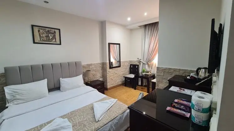 Deluxe Tek Büyük veya İki Ayrı Yataklı Oda