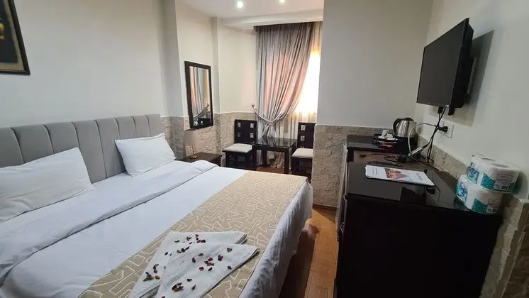 Deluxe Tek Büyük veya İki Ayrı Yataklı Oda