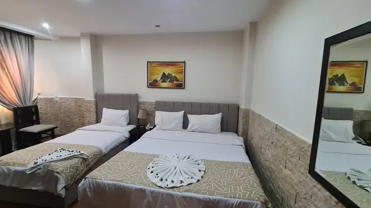 Deluxe Tek Büyük veya İki Ayrı Yataklı Oda