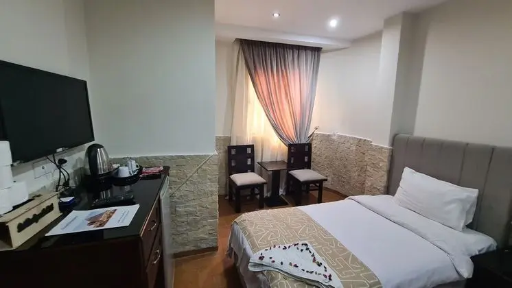 Deluxe Tek Büyük veya İki Ayrı Yataklı Oda
